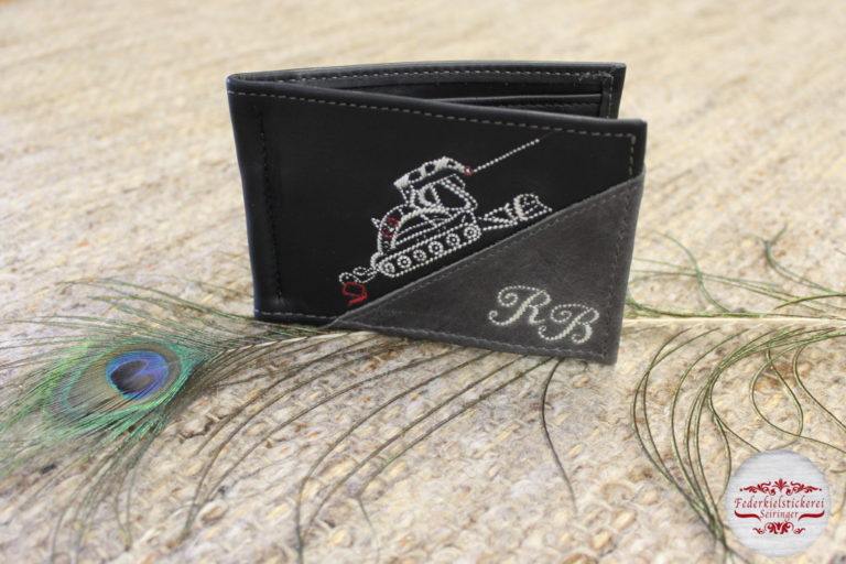Zweifärbige Geldtasche mit Pistengerät